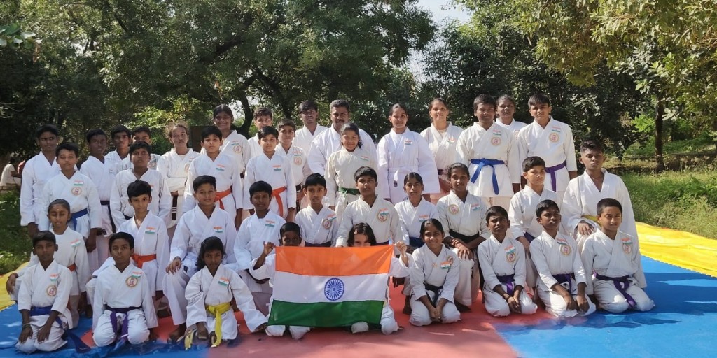 Outdoor karate group photo with Indian flag